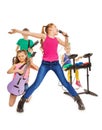 Children play musical instruments and girl sings Royalty Free Stock Photo