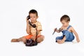 Children play with old phone Royalty Free Stock Photo