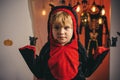 Children play with pumpkins and treat. 31 october. Happy Halloween Quotes and Sayings. Witch hat. Halloween Witch with a