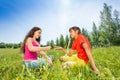Children play rock-paper-scissors on grass Royalty Free Stock Photo