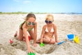 Children play with sand on beach Royalty Free Stock Photo