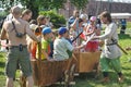 Children play with shields at the Norwegian Vikings festival of medieval culture