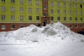 Children play on a snow slide in the polar city of Norilsk