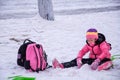 Children play with snow