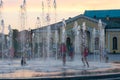 Children play and splash in the city`s fountains in the square. Editorial. 08.03.2017