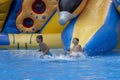 Children play and swim in pool. Two children are having fun in pool. Friends splashing in pool having fun leisure time. Summer Royalty Free Stock Photo