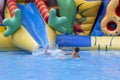 Children play and swim in pool. Two children are having fun in pool. Friends splashing in pool having fun leisure time. Summer Royalty Free Stock Photo
