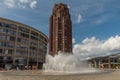 Children play in the water flows from the fountain in front of the Main Plaza Tower, Frankfurt, Germany