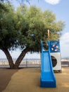 Children playground with blue slip