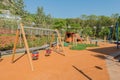 Children playground on bright summer day Royalty Free Stock Photo