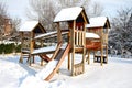 Children Playground In Public Park Covered With Winter Snow Royalty Free Stock Photo