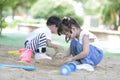 Children on the playground in the summer park Little boy playing in the sand on the playground. Royalty Free Stock Photo