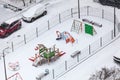 Children playground in winter season, equipment covered with snow, view from above Royalty Free Stock Photo