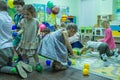 Children playing active games in the kindergarten.