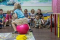 Children playing active games in the kindergarten.