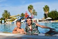 Children playing on the beach. funny kids in the water park in the summer hotel Royalty Free Stock Photo