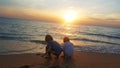 Children playing on the beach at sunset. sea, Travel and vacation concept, Summer time concept