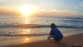 Children playing on the beach at sunset. sea, Travel and vacation concept, Summer time concept Royalty Free Stock Photo