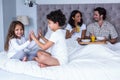 Children playing on the bed Royalty Free Stock Photo