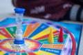Children playing the board game `Articulate`. Royalty Free Stock Photo
