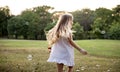 Children is playing bubbles in a park Royalty Free Stock Photo