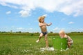 Children Playing in Bubbley Water Royalty Free Stock Photo