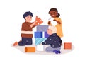 Children playing, building castle from toy blocks together. Kindergarten girl and boys friends. Happy little kids during Royalty Free Stock Photo