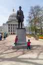 Children Playing by Capital Statue Royalty Free Stock Photo