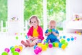 Children playing with colorful toys Royalty Free Stock Photo