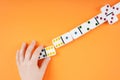 Children playing domino game. Royalty Free Stock Photo