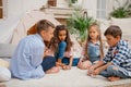 Children playing domino game together at home Royalty Free Stock Photo