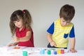 Children playing and drawing at home or kindergarten or playschool Royalty Free Stock Photo