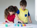 Children playing and drawing at home or kindergarten or playschool Royalty Free Stock Photo