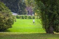 Children playing football in the famous Sempione park in milan Royalty Free Stock Photo
