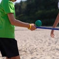 Children playing in the game with a ball on the board Royalty Free Stock Photo