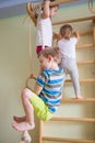 Children playing on the gymnastic equipment Royalty Free Stock Photo