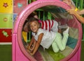 Children playing and having a good time in kids zone in amusemen Royalty Free Stock Photo