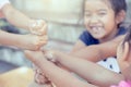 Children playing and holding hands together Royalty Free Stock Photo