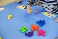 Children playing with homemade educational toys Royalty Free Stock Photo