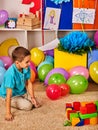 Children playing in kids club indoor. Lesson in primary school.