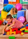 Children playing in kids club indoor. Lesson in primary school. Royalty Free Stock Photo
