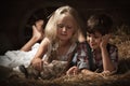 Children playing with a kitten Royalty Free Stock Photo