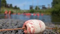 Children playing in a lake at an outdoor activity centre Royalty Free Stock Photo