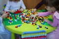 Children playing with lego