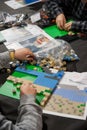 Children playing Lego at the table