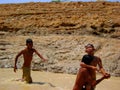 Children playing in muddy waters