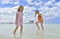 Children playing in the ocean. Royalty Free Stock Photo