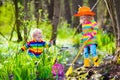 Children playing outdoors catching frog Royalty Free Stock Photo