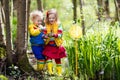 Children playing outdoors catching frog Royalty Free Stock Photo