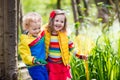 Children playing outdoors catching frog Royalty Free Stock Photo